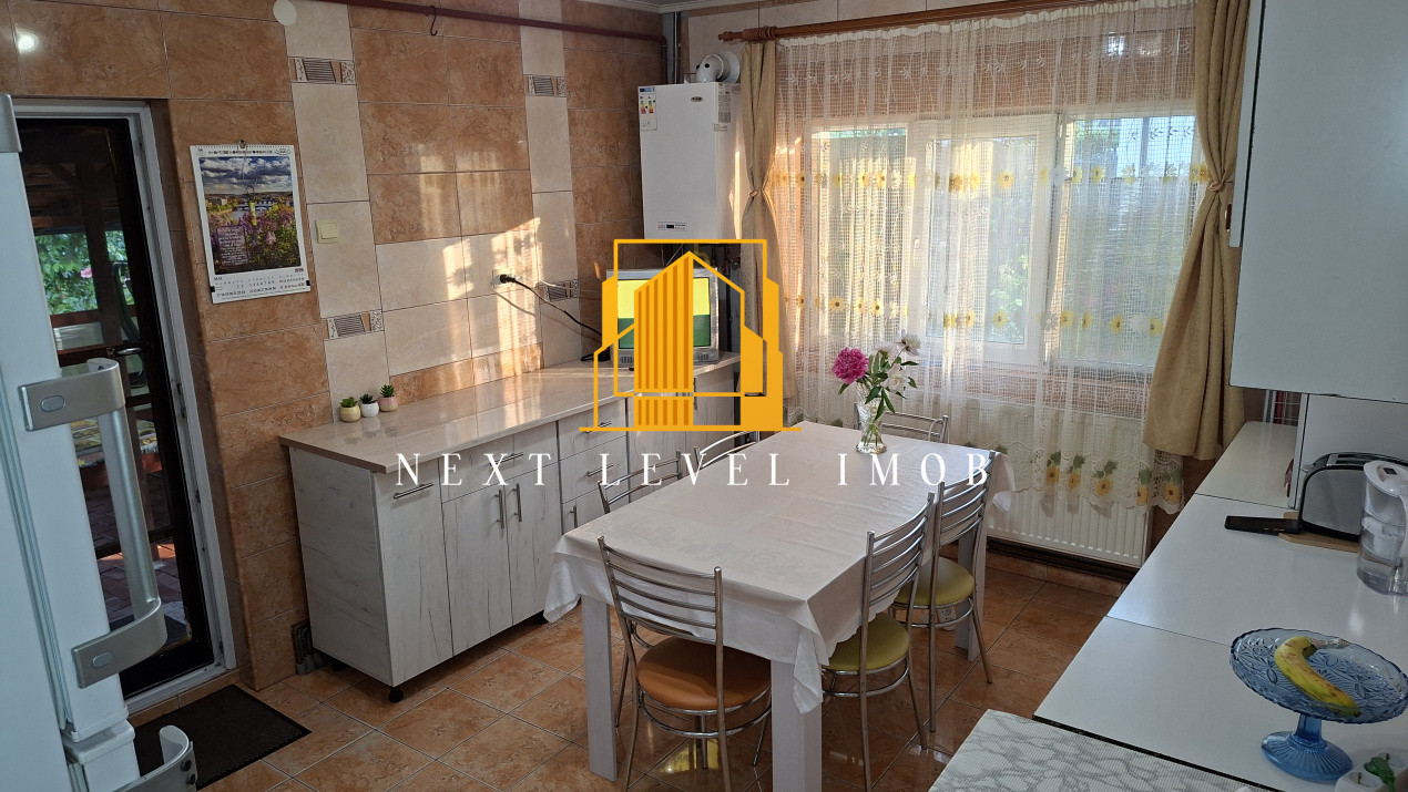 Casă cu teren 1000mp - zona SLAVA